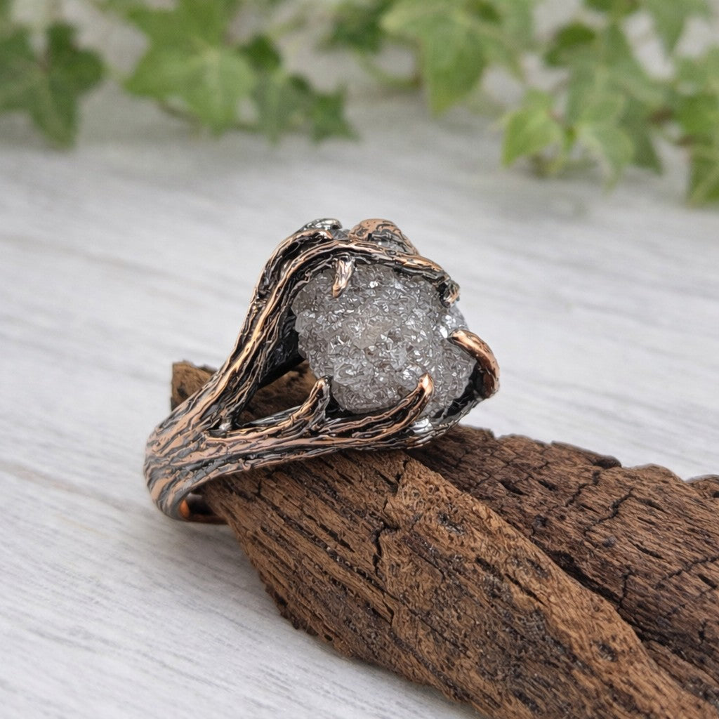 raw rough diamond in a handmade twig and branch style solid gold setting