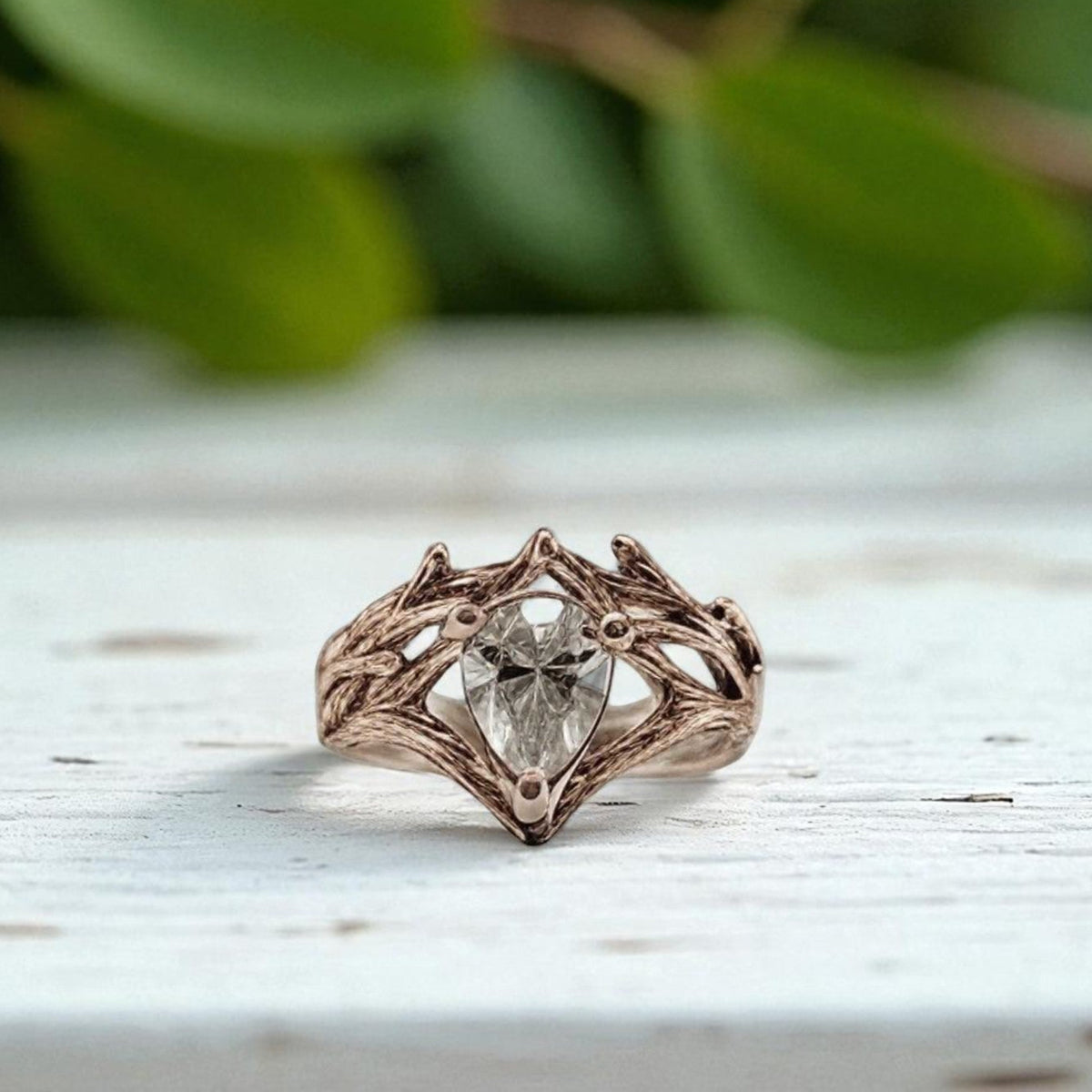 Pear-shaped rose gold diamond ring