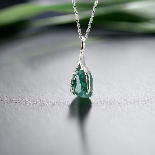 Green hand-cut raw emerald twig style pendant in solid white gold